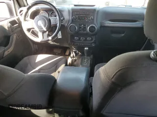 2018 Jeep Wrangler JK Unlimited Sport S with VIN 1C4BJWDG5JL828612, listed as a Copart auction lot 72783014 with 159,029 mi miles and Salvage Title. Bid and sale history available at carsss.com. Image 8.
