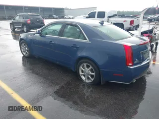 2009 Cadillac CTS AWD w/1SB with VIN 1G6DT57V190120218, listed as a IAAI auction lot 42105030 with 214,031 mi miles. Bid and sale history available at carsss.com. Image 3.