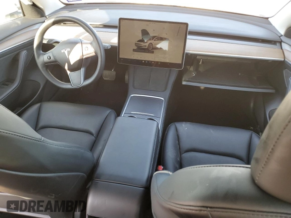 2023 Tesla Model 3 with VIN 5YJ3E1EA4PF631304, listed as a Copart auction lot 52500695 with 33,024 mi miles and Salvage title. Bid and sale history available at DreamBid. Image 8.