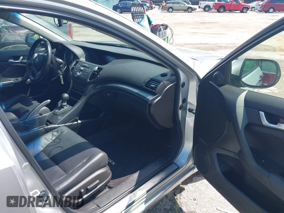 2012 Acura TSX with VIN JH4CU2F44CC016338, listed as a IAAI auction lot 42425648 with 129,090 mi miles and . Bid and sale history available at DreamBid. Image 5.