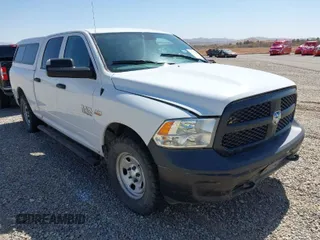 2018 Ram 1500 Tradesman z VIN 1C6RR7ST8JS291454, wystawiony jako IAAI lot #41799928 z przebiegiem Nie podano mil oraz . Historia ofert i sprzedaży dostępna na DreamBid. Obrazek 1.