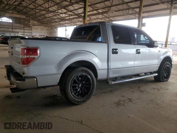 2012 Ford F-150 XL with VIN 1FTFW1EF1CKE10648, listed as a Copart auction lot 63333505 with 160,764 mi miles and Salvage title. Bid and sale history available at DreamBid. Image 3.