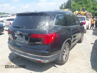 2017 Honda Pilot Touring с VIN 5FNYF5H9XHB024868, выставлен на аукционе IAAI как лот 42300608 с пробегом 133 018 миль миль и . История ставок и продаж доступна на DreamBid. Изображение 4.