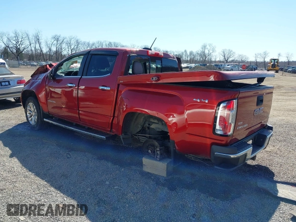 2015 GMC Canyon 4WD SLT z VIN 1GTG6CE38F1266466, wystawiony jako IAAI lot #41822501 z przebiegiem 26 479 mil mil oraz . Historia ofert i sprzedaży dostępna na DreamBid. Obrazek 3.