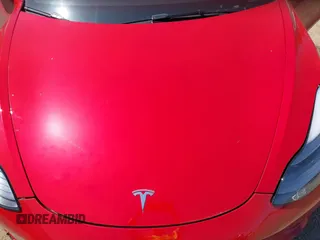 2023 Tesla Model 3 Long Range with VIN 5YJ3E1EBXPF603421, listed as a IAAI auction lot 42105037 with 13,186 mi miles and . Bid and sale history available at DreamBid. Image 10.