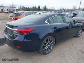 2016 Mazda Mazda6 i Grand Touring with VIN JM1GJ1W57G1486962, listed as a IAAI auction lot 41813471 with 64,078 mi miles. Bid and sale history available at carsss.com. Image 4.