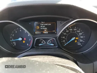 2018 Ford Focus Titanium z VIN 1FADP3N2XJL297048, wystawiony jako Copart lot #61579925 z przebiegiem 68 774 mil mil oraz Szkoda całkowita • Salvage title. Historia ofert i sprzedaży dostępna na DreamBid. Obrazek 9.