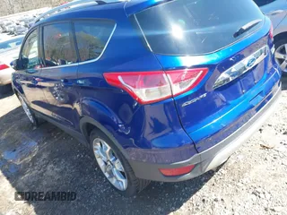 2015 Ford Escape Titanium with VIN 1FMCU0J93FUC20745, listed as a IAAI auction lot 41781551 with 174,538 mi miles and . Bid and sale history available at DreamBid. Image 3.