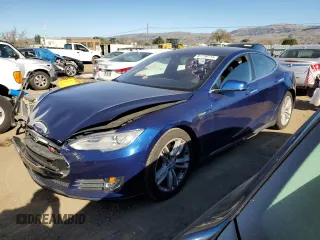 2015 Tesla Model S 85D with VIN 5YJSA1S20FF086141, listed as a Copart auction lot 87739715 with 70,161 mi miles and Salvage Title. Bid and sale history available at carsss.com. Image 1.
