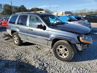 2001 Jeep Grand Cherokee Laredo z VIN 1J4GW48S91C578800, wystawiony jako Copart lot #87934695 z przebiegiem 250 784 mil mil oraz Szkoda całkowita • Salvage title. Historia ofert i sprzedaży dostępna na DreamBid. Obrazek 4.