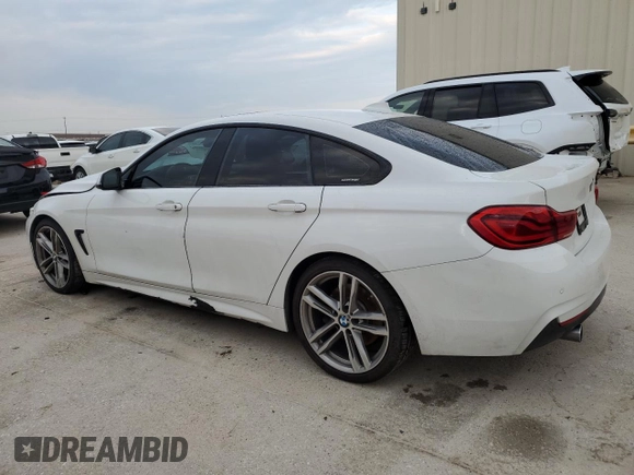 2018 BMW 4 Series 440i with VIN WBA4J5C51JBF06736, listed as a Copart auction lot 64165524 with 65,066 mi miles and Salvage Title. Bid and sale history available at DreamBid. Image 2.
