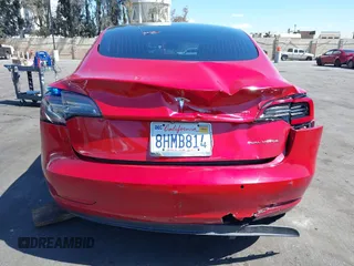 2018 Tesla Model 3 Long Range Battery with VIN 5YJ3E1EB5JF146184, listed as a IAAI auction lot 41808346 with 97,496 mi miles and . Bid and sale history available at DreamBid. Image 17.