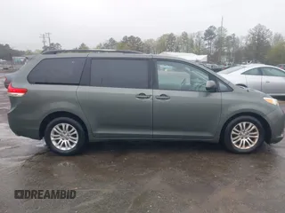 2013 Toyota Sienna XLE AAS with VIN 5TDYK3DC8DS401561, listed as a IAAI auction lot 41990044 with 214,111 mi miles and . Bid and sale history available at DreamBid. Image 13.