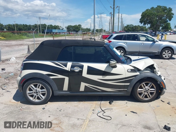 2015 MINI Convertible with VIN WMWZN3C53FT861968, listed as a IAAI auction lot 42717485 with 79,840 mi miles and . Bid and sale history available at DreamBid. Image 13.