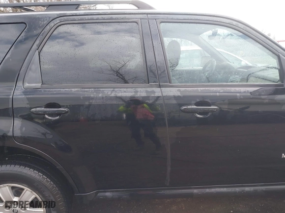 2008 Mercury Mariner with VIN 4M2CU81Z08KJ24857, listed as a IAAI auction lot 41645349 with 214,314 mi miles. Bid and sale history available at carsss.com. Image 13.