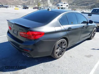 2020 BMW 5 Series 530e with VIN WBAJA9C02LCD31800, listed as a IAAI auction lot 41669765 with 99,024 mi miles and . Bid and sale history available at DreamBid. Image 4.