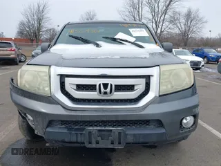 2011 Honda Pilot EX-L with VIN 5FNYF4H65BB009279, listed as a IAAI auction lot 41554301 with 226,337 mi miles and . Bid and sale history available at carsss.com. Image 12.
