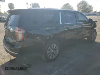 2023 Chevrolet Suburban LT with VIN 1GNSCCKD1PR124986, listed as a Copart auction lot 87432904 with 105,026 mi miles and Salvage Title. Bid and sale history available at DreamBid. Image 3.