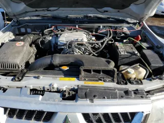 2003 Mitsubishi Montero LTD with VIN JA4NW51S23J039876, listed as a Copart auction lot 88539975 with 181,008 mi miles and Salvage Title. Bid and sale history available at carsss.com. Image 12.