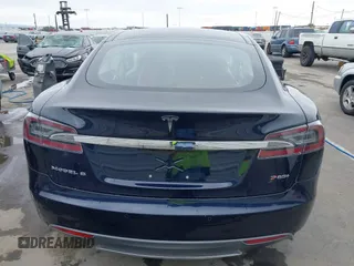 2014 Tesla Model S 60 with VIN 5YJSA1H10EFP30234, listed as a IAAI auction lot 42182249 with 186,654 mi miles and . Bid and sale history available at DreamBid. Image 16.