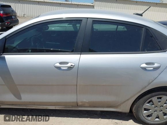 2023 Kia Rio S z VIN 3KPA24AD6PE600384, wystawiony jako IAAI lot #42003099 z przebiegiem 27 001 mil mil oraz . Historia ofert i sprzedaży dostępna na DreamBid. Obrazek 14.