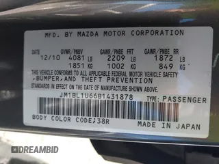 2011 Mazda Mazda3 s Sport with VIN JM1BL1U66B1431878, listed as a IAAI auction lot 41991974 with 44,302 mi miles. Bid and sale history available at carsss.com. Image 9.