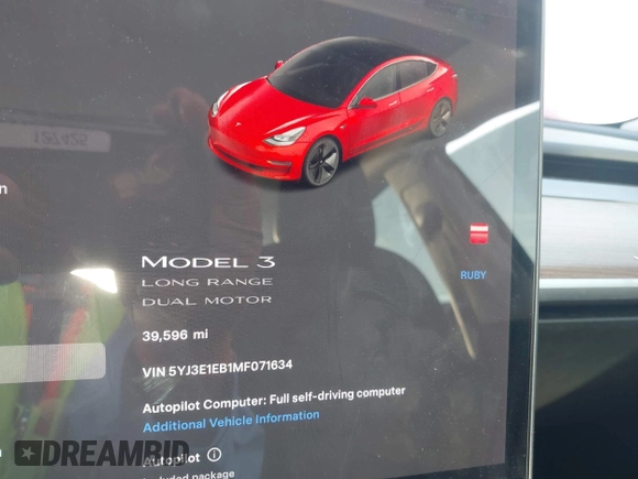 2021 Tesla Model 3 Long Range with VIN 5YJ3E1EB1MF071634, listed as a IAAI auction lot 41964321 with 39,596 mi miles. Bid and sale history available at carsss.com. Image 7.