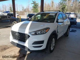 2021 Hyundai Tucson Value with VIN KM8J33A45MU316051, listed as a IAAI auction lot 41692349 with 59,096 mi miles. Bid and sale history available at carsss.com. Image 2.