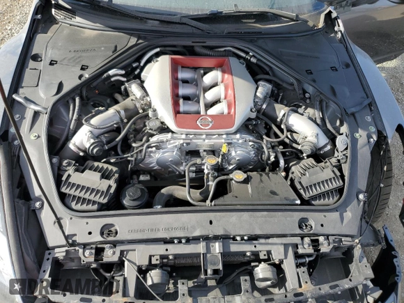 2017 Nissan GT-R Premium z VIN JN1AR5EF0HM820283, wystawiony jako Copart lot #80291674 z przebiegiem 98 489 mil mil oraz Szkoda całkowita • Salvage title. Historia ofert i sprzedaży dostępna na DreamBid. Obrazek 13.