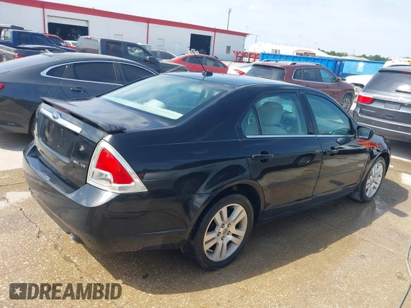 2009 Ford Fusion SEL with VIN 3FAHP08159R213704, listed as a IAAI auction lot 41988480 with 277,803 mi miles. Bid and sale history available at carsss.com. Image 4.