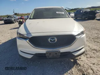 2018 Mazda CX-5 Sport with VIN JM3KFBBMXJ0309289, listed as a Copart auction lot 48866565 with 64,040 mi miles and Salvage Title. Bid and sale history available at carsss.com. Image 5.