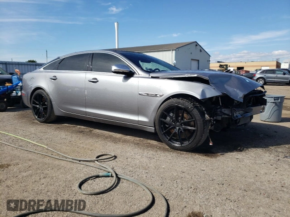 2011 Jaguar XJ with VIN SAJXA2GE5BMV13122, listed as a Copart auction lot 73113044 with 164,196 mi miles and Salvage Title. Bid and sale history available at DreamBid. Image 4.