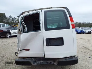 2016 Chevrolet Express Cargo Van with VIN 1GCWGBFF9G1274606, listed as a IAAI auction lot 41566652 with 296,452 mi miles. Bid and sale history available at carsss.com. Image 16.