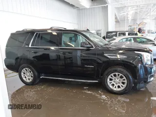 2020 GMC Yukon SLT with VIN 1GKS2BKC6LR232354, listed as a IAAI auction lot 41313325 with 107,960 mi miles. Bid and sale history available at carsss.com. Image 13.