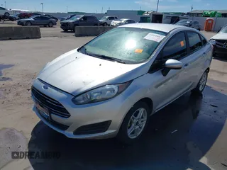 2019 Ford Fiesta SE with VIN 3FADP4BJXKM146258, listed as a IAAI auction lot 41652852 with 94,379 mi miles. Bid and sale history available at carsss.com. Image 2.