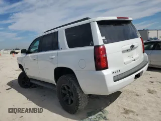 2019 Chevrolet Tahoe LT with VIN 1GNSKBKC7KR392177, listed as a Copart auction lot 45960845 with 96,180 mi miles and Salvage title. Bid and sale history available at DreamBid. Image 2.