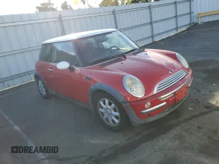 2004 MINI Hardtop with VIN WMWRC33474TJ53569, listed as a Copart auction lot 72429454 with 154,713 mi miles and Salvage Title. Bid and sale history available at DreamBid. Image 4.