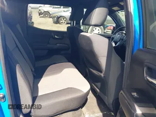 2021 Toyota Tacoma SR z VIN 3TMCZ5AN8MM374398, wystawiony jako IAAI lot #42297138 z przebiegiem 87 205 mil mil oraz . Historia ofert i sprzedaży dostępna na DreamBid. Obrazek 8.
