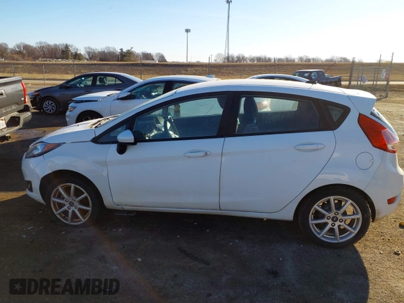 2019 Ford Fiesta SE z VIN 3FADP4EJ0KM148306, wystawiony jako IAAI lot #41666170 z przebiegiem 68 966 mil mil oraz . Historia ofert i sprzedaży dostępna na DreamBid. Obrazek 14.