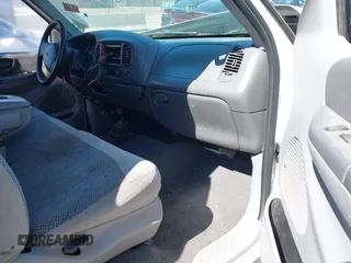 1999 Ford F-150 XL с VIN 1FTRX18L0XKB29703, выставлен на аукционе IAAI как лот 41644163 с пробегом Не указан миль и . История ставок и продаж доступна на DreamBid. Изображение 5.