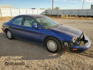 1996 Mercury Sable GS z VIN 1MELM50U3TA659219, wystawiony jako Copart lot #74373944 z przebiegiem 156 398 mil mil oraz Szkody całkowita. Historia ofert i sprzedaży dostępna na DreamBid. Obrazek 4.
