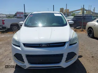 2015 Ford Escape SE with VIN 1FMCU0G91FUC65044, listed as a IAAI auction lot 42083688 with 111,972 mi miles and . Bid and sale history available at carsss.com. Image 13.