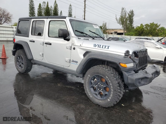2023 Jeep Wrangler 4xe with VIN 1C4JJXN65PW661358, listed as a Copart auction lot 52500645 with 39,667 mi miles and Clean Title. Bid and sale history available at carsss.com. Image 4.