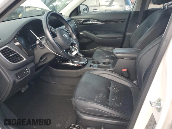2021 Kia Seltos SX with VIN KNDETCA20M7078855, listed as a Copart auction lot 58071695 with 50,951 mi miles and Salvage title. Bid and sale history available at DreamBid. Image 7.