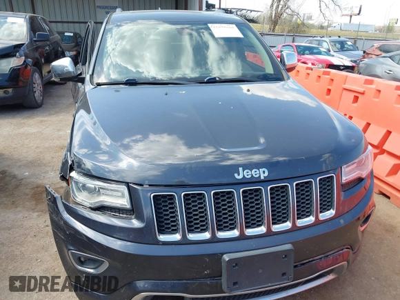 2015 Jeep Grand Cherokee Overland with VIN 1C4RJFCG6FC831641, listed as a IAAI auction lot 41877680 with 143,568 mi miles. Bid and sale history available at carsss.com. Image 12.