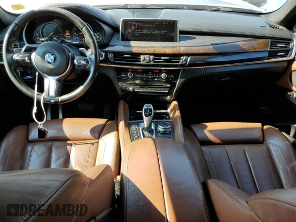 2015 BMW X6 xDrive50i with VIN 5UXKU6C50F0F94199, listed as a Copart auction lot 70680312 with 106,650 mi miles. Bid and sale history available at carsss.com. Image 8.