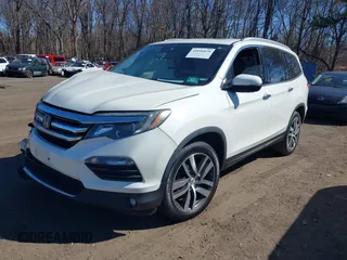 2017 Honda Pilot Touring z VIN 5FNYF6H99HB089121, wystawiony jako IAAI lot #41896878 z przebiegiem 145 330 mil mil oraz . Historia ofert i sprzedaży dostępna na DreamBid. Obrazek 17.