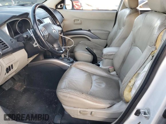 2007 Mitsubishi Outlander XLS z VIN JA4MT41XX7U011855, wystawiony jako Copart lot #89026105 z przebiegiem 254 849 mil mil oraz Szkoda całkowita • Salvage title. Historia ofert i sprzedaży dostępna na DreamBid. Obrazek 7.