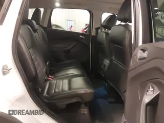 2016 Ford Escape Titanium with VIN 1FMCU9J99GUA61848, listed as a IAAI auction lot 42300324 with 51,692 mi miles and . Bid and sale history available at DreamBid. Image 8.