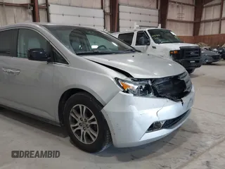 2012 Honda Odyssey EX z VIN 5FNRL5H47CB045705, wystawiony jako IAAI lot #42384430 z przebiegiem 157 598 mil mil oraz . Historia ofert i sprzedaży dostępna na DreamBid. Obrazek 17.